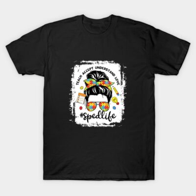 Black t-shirt with colorful puzzle design, featuring "Teach Accept Understand Love" and "#spedlife" text. Casual wear.