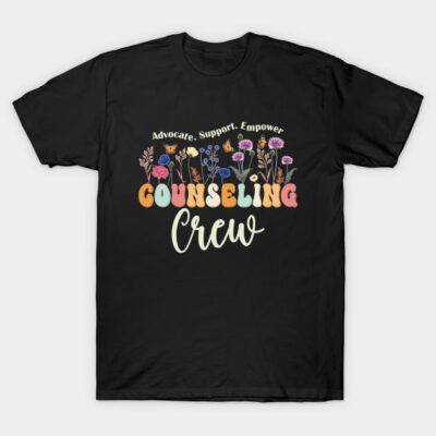 Black "Counseling Crew" t-shirt with colorful floral design, cotton material, casual wear, advocate support empower message.