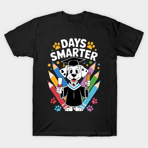 Black "Days Smarter" t-shirt with cartoon dog in graduation attire, colorful pencil background, playful design.