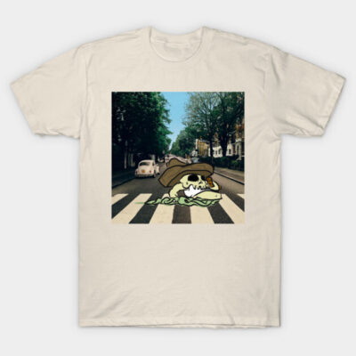 Cream t-shirt featuring a whimsical skull graphic on a crosswalk, casual style for everyday wear.