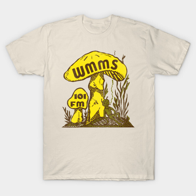 "Vintage cream t-shirt with yellow WMMS 101 FM mushroom graphic, casual style, soft cotton material."