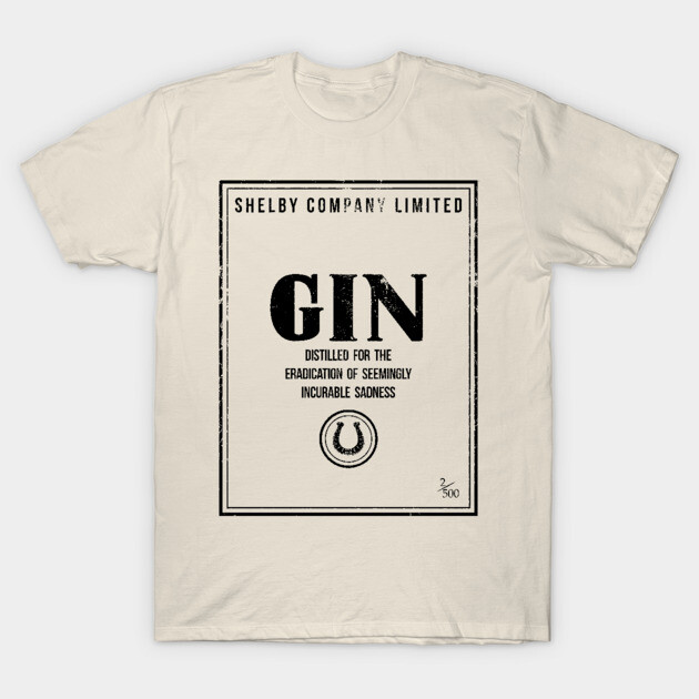 Beige T-shirt with vintage-style gin label design, featuring black text and logo. Casual wear, cotton material.