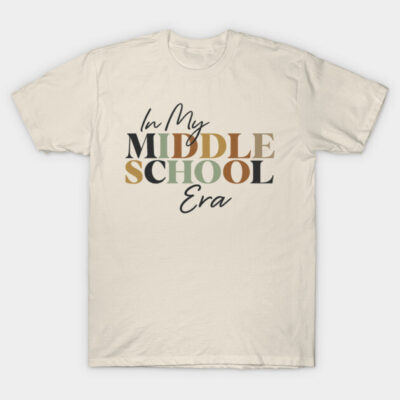 Cream t-shirt with "In My Middle School Era" text in multicolor retro style, casual wear, cotton material.