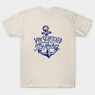 Beige t-shirt with navy blue nautical anchor design and text, casual style, ideal for everyday wear.