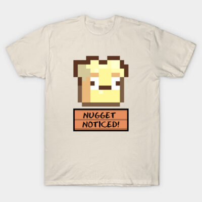 Beige t-shirt with pixel art design and "Nugget Noticed" text, casual wear for gaming enthusiasts.