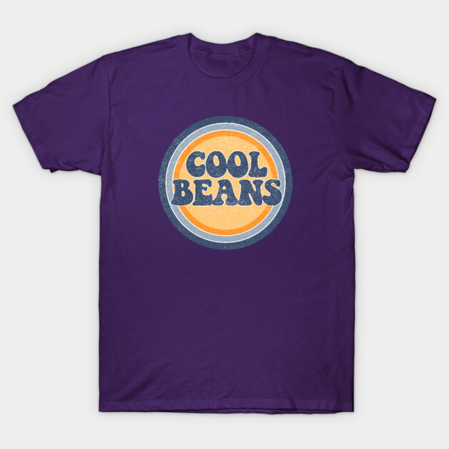 Purple t-shirt with "Cool Beans" retro graphic, casual style, cotton material, perfect for everyday wear.
