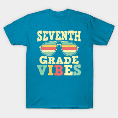 Blue t-shirt with "Seventh Grade Vibes" text and sunglasses graphic, casual style, perfect for school wear.