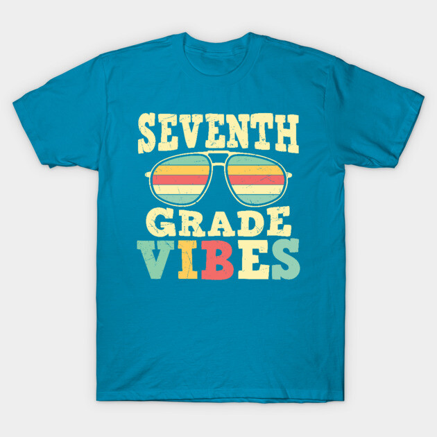 Blue t-shirt with "Seventh Grade Vibes" text and sunglasses graphic, casual style, perfect for school wear.