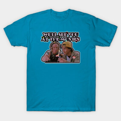 Blue graphic tee with "We'll See You at the Movies" text, casual style, ideal for movie enthusiasts.