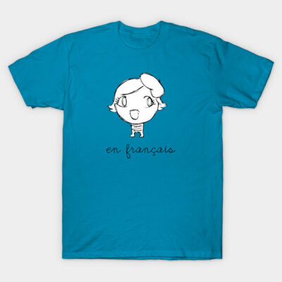 Blue graphic t-shirt with cartoon character and "en français" text, casual wear, soft cotton material.