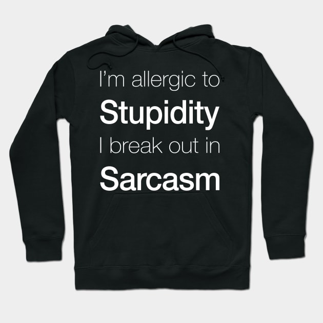 Black hoodie with humorous text "I'm allergic to stupidity, I break out in sarcasm," perfect for casual wear.