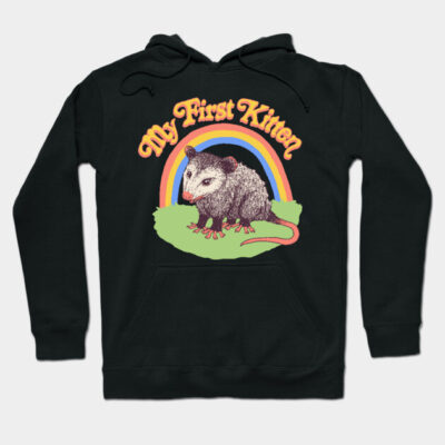 Black hoodie with "My First Kitten" text, featuring a possum and rainbow graphic. Casual style, cozy material.