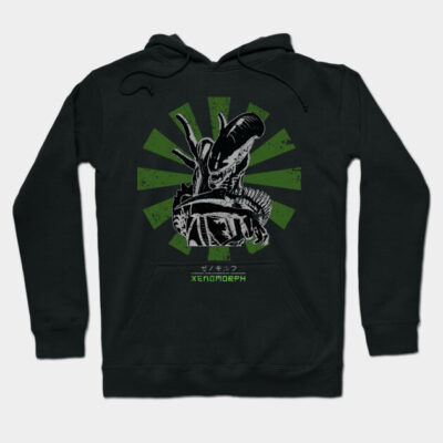 Black hoodie with green graphic design featuring an alien creature. Comfortable cotton material, perfect for casual wear.