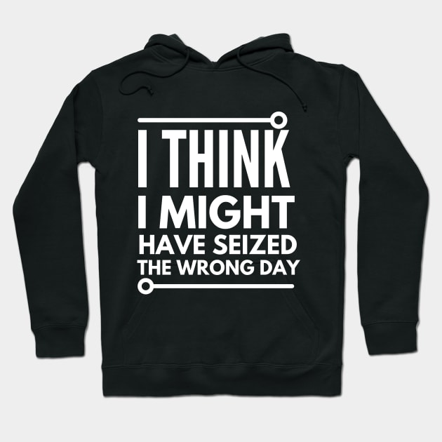 Black hoodie with humorous text "I Think I Might Have Seized The Wrong Day", casual style, cotton blend material.