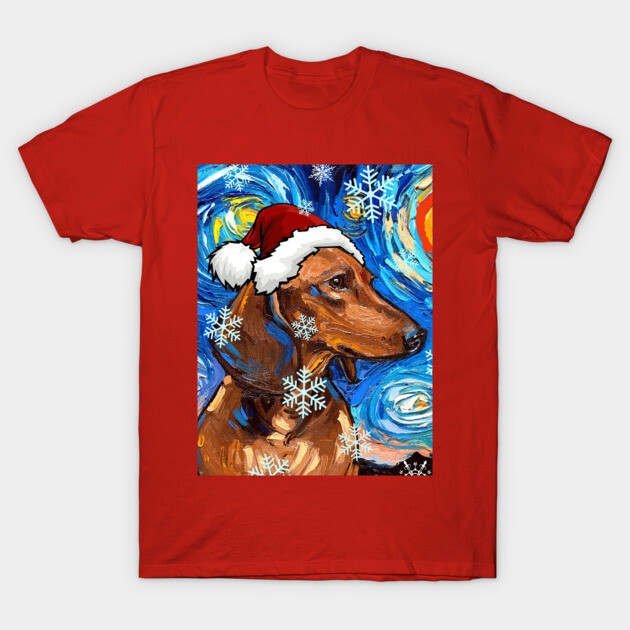 Red festive t-shirt featuring a dog in a Santa hat with snowflakes and a starry background, perfect for holiday wear.