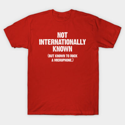 Red graphic t-shirt with "Not Internationally Known" text, casual style, cotton material, unisex design.