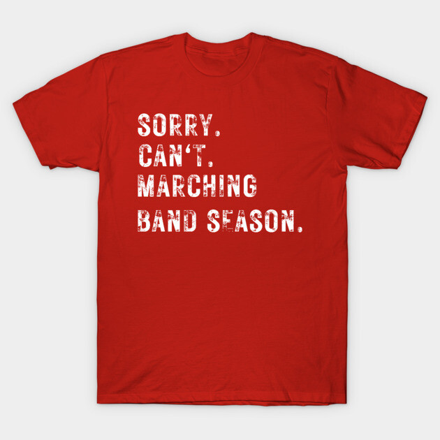 Red t-shirt with white text "Sorry. Can't. Marching Band Season." Casual wear, cotton material, unisex design.