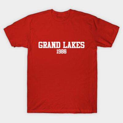 Red cotton t-shirt with "Grand Lakes 1986" printed in white, casual style for everyday wear.