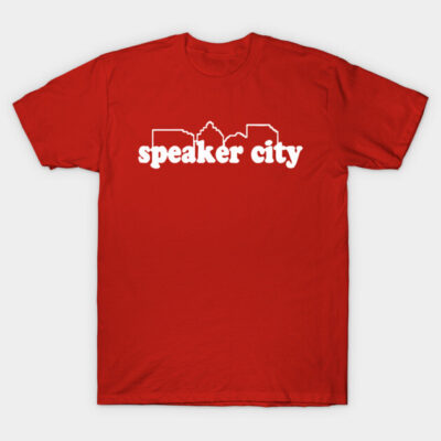 Red "Speaker City" t-shirt featuring white text and cityscape design, casual cotton wear, ideal for everyday comfort.