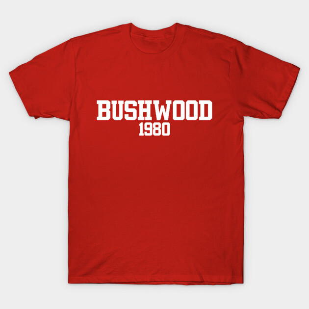 Red graphic T-shirt with "BUSHWOOD 1980" text, casual style, cotton material, perfect for everyday wear.