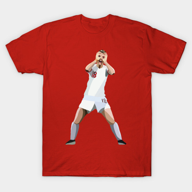 Red cotton t-shirt featuring graphic of soccer player in white uniform. Casual sportswear, perfect for fans and enthusiasts.