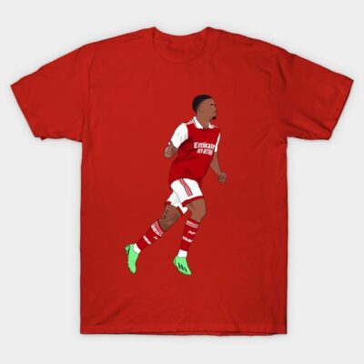Red cotton t-shirt featuring illustrated soccer player, sporty design, perfect for casual wear and sports fans.