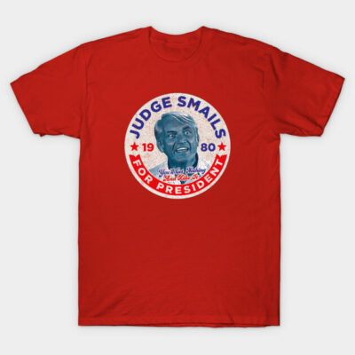 Red graphic t-shirt with vintage-style "Judge Smails for President 1980" design, ideal for casual wear.