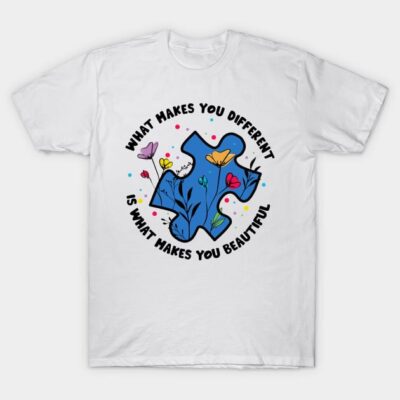 White t-shirt with colorful puzzle piece and floral design, featuring inspirational quote for casual wear.