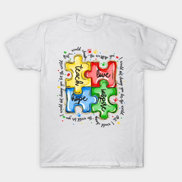 White t-shirt with colorful puzzle design featuring words "teach," "love," "hope," "inspire," ideal for casual wear.