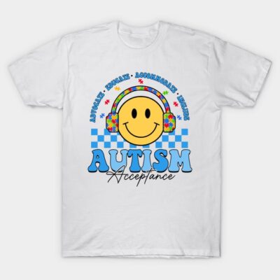 White autism acceptance t-shirt with smiley face and colorful headphones design, promotes advocacy and inclusion.