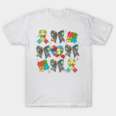 White T-shirt with colorful puzzle pieces, bows, and ribbon design, ideal for casual wear or autism awareness.
