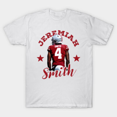 White t-shirt featuring a football player graphic with red jersey and helmet, ideal for sports fans and casual wear.
