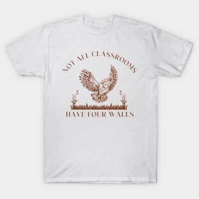 White T-shirt with "Not All Classrooms Have Four Walls" text and owl graphic, casual style, cotton material.