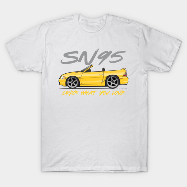 White t-shirt featuring yellow convertible car graphic with "SN95" text, perfect for car enthusiasts and casual wear.