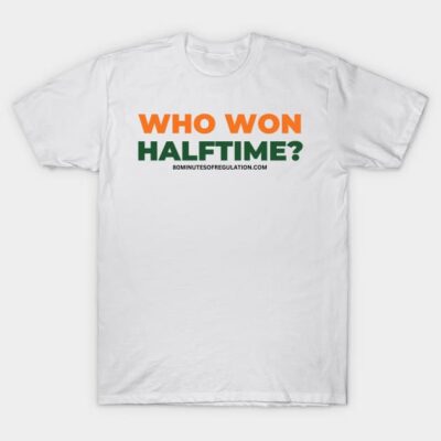 White t-shirt with bold "Who Won Halftime?" text in orange and green, casual style, cotton material.