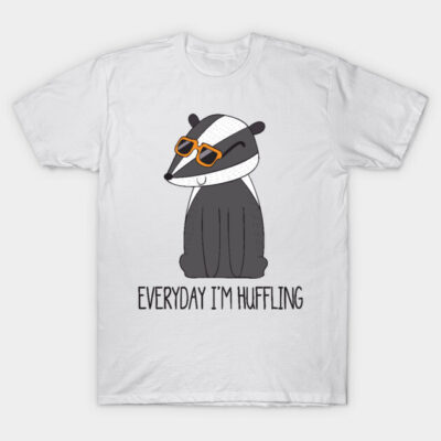 White T-shirt with cartoon badger wearing sunglasses and "Everyday I'm Huffling" text, casual graphic design.