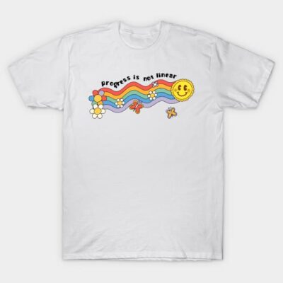 White t-shirt with colorful "Progress is Not Linear" graphic, featuring rainbow, sun, and flowers. Cotton, casual wear.