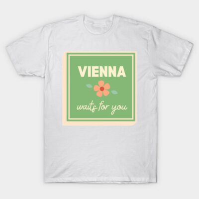 White T-shirt with "Vienna waits for you" graphic, green and peach floral design. Casual, comfortable cotton wear.