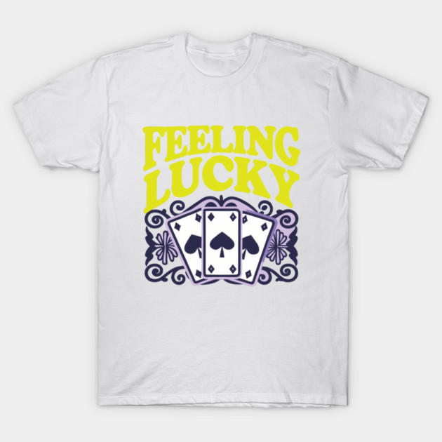 White t-shirt with "Feeling Lucky" text and card design, casual style, cotton material, perfect for everyday wear.