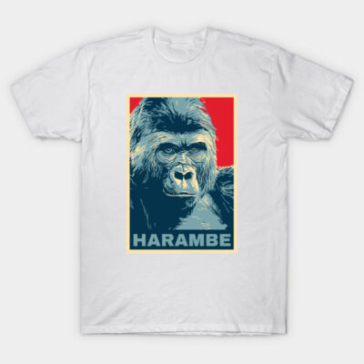 White t-shirt featuring a graphic of a gorilla with bold colors and "Harambe" text, casual style, cotton material.