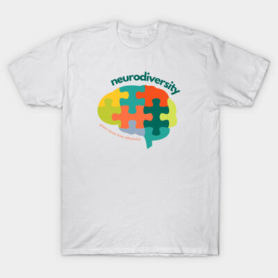 White t-shirt with colorful puzzle brain design, promoting neurodiversity awareness. Cotton material, casual style.