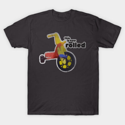 Black T-shirt with vintage tricycle graphic and "this is how we rolled" text, casual cotton apparel for everyday wear.
