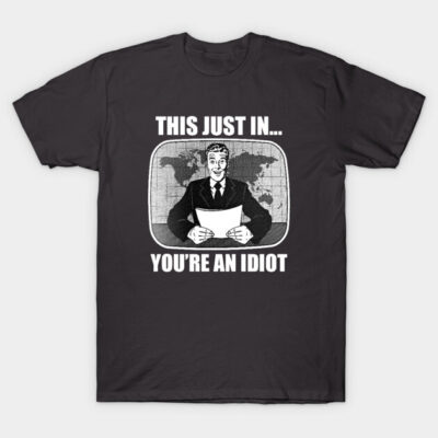Black graphic t-shirt with humorous vintage TV news print, cotton material, casual wear.