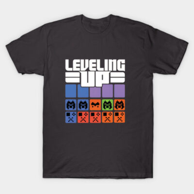 Black "Leveling Up" graphic t-shirt, pixel art design, casual wear, soft cotton, unisex style, multiple colors in print.
