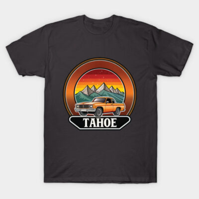 Black t-shirt with retro Tahoe design, featuring an orange car and mountain sunset graphic. Casual wear, cotton material.