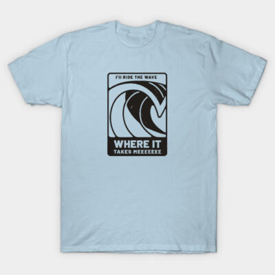 Light blue t-shirt with wave graphic and "I'll ride the wave where it takes me" text, casual cotton style.