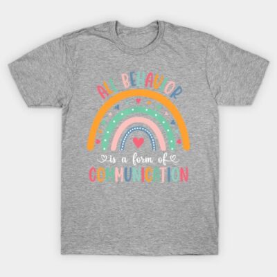 Gray t-shirt with colorful rainbow design and "All Behavior is a Form of Communication" text. Casual and comfortable style.