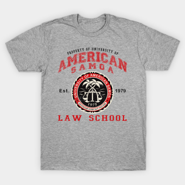 Gray graphic t-shirt featuring "American Samoa Law School" design in red and black, casual wear, cotton blend.