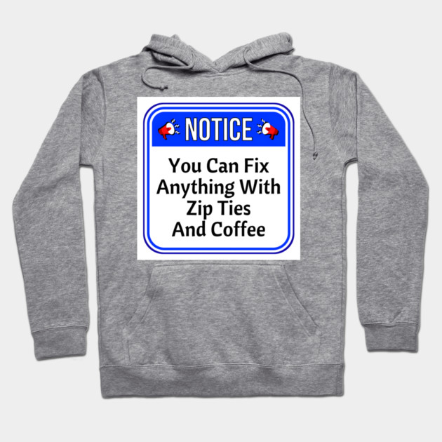 Gray hoodie with "Notice: You Can Fix Anything With Zip Ties And Coffee" text, casual style, cotton blend.
