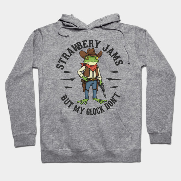 Gray hoodie with cowboy frog graphic, text "Strawberry Jams, But My Glock Don't," casual cotton blend sweatshirt.